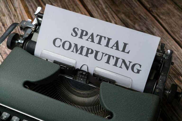 A typewriter with a paper that says spatial computing